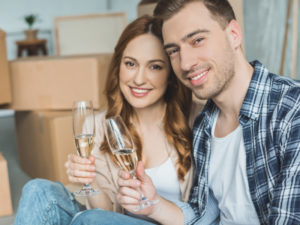 Young Couple Celebrating Their new home in Spring Texas